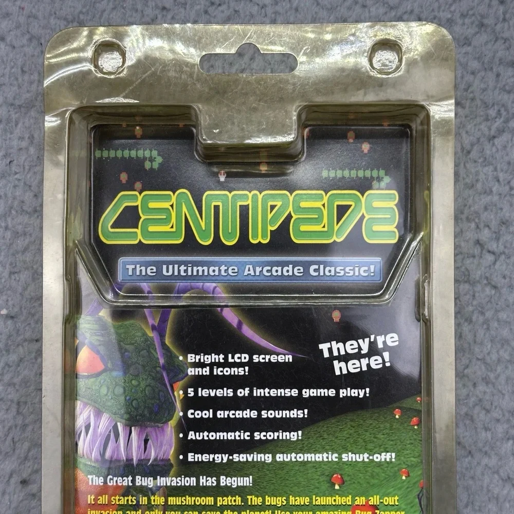NIP 2003 MGA Entertainment 27604SL Centipede Arcade Classic Handheld Game 248279